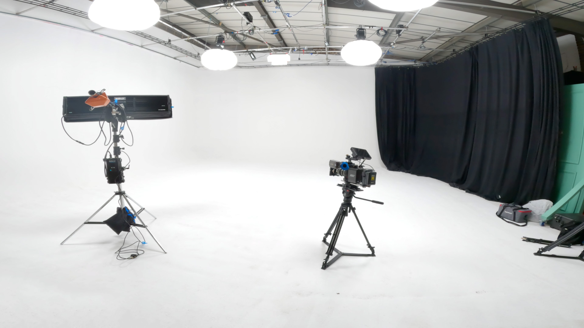 Photo studio hire London showing professional camera, lighting equipment, and product photography setup in a modern studio space